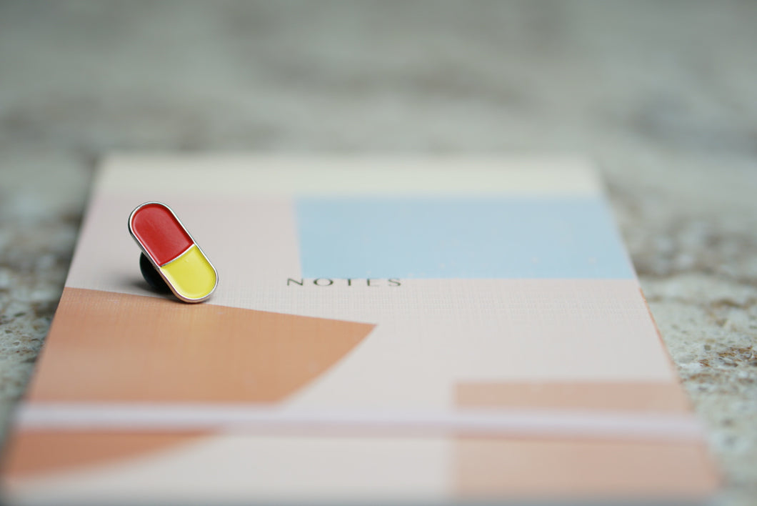 Capsule Lapel Pin